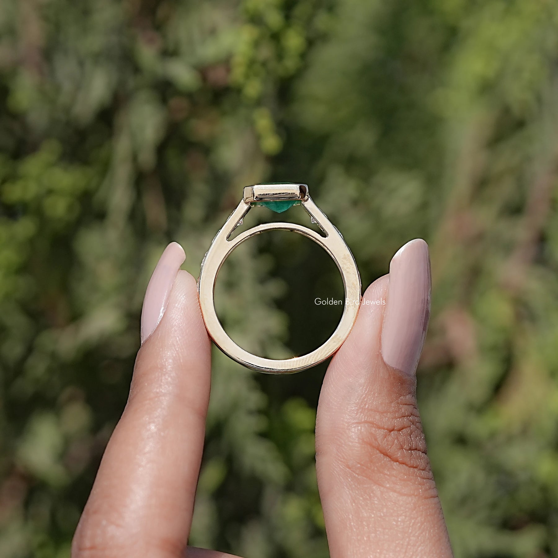 Back view of Bezel Cut Moissanite Solitaire Ring in secure setting 