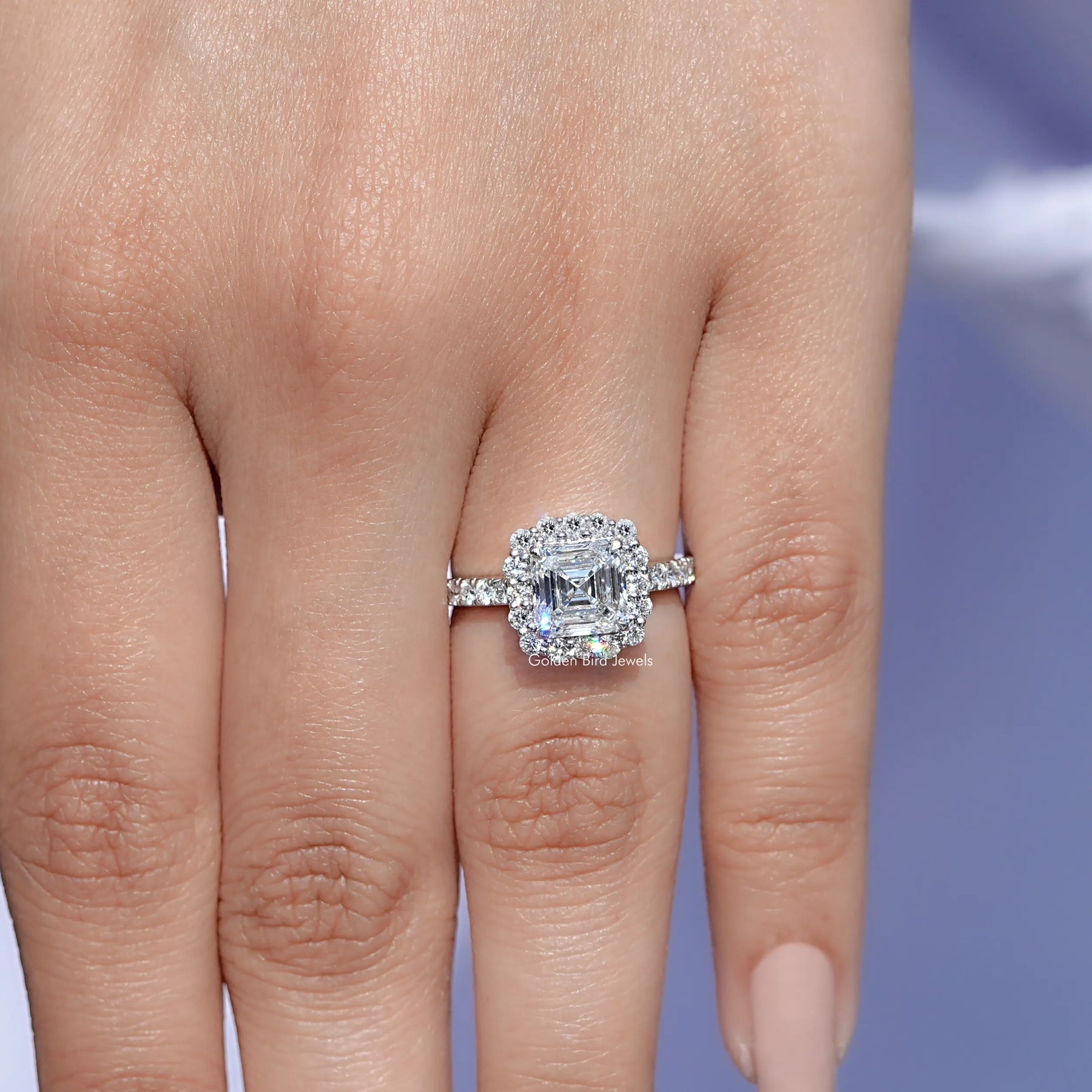 In finger front view of Asscher Moissanite Engagement Ring in unique shape