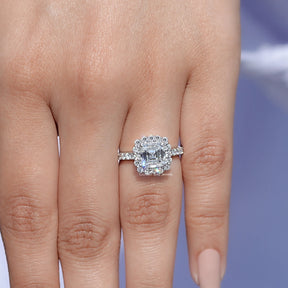 In finger front view of Asscher Moissanite Engagement Ring in unique shape