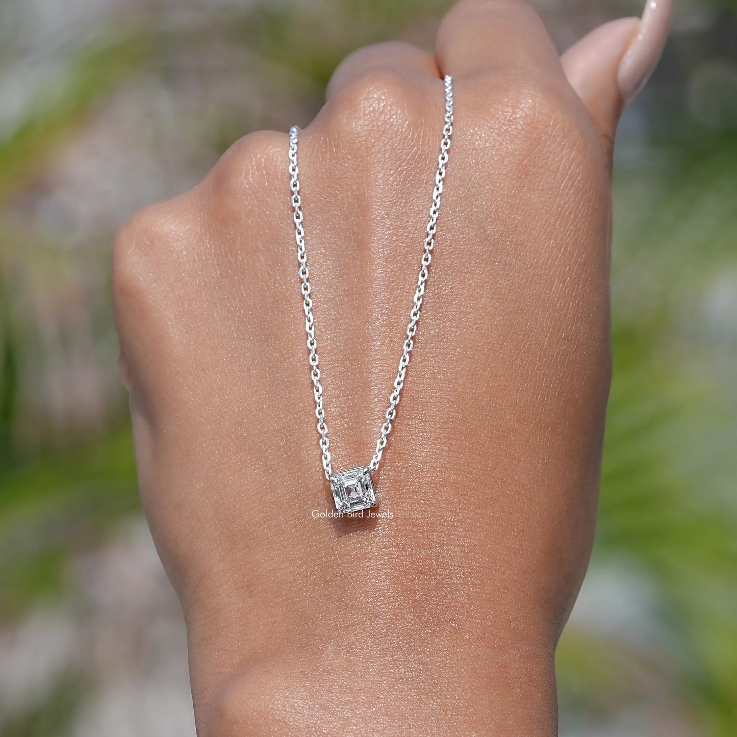 In front view of diamond Asscher Shape pendant