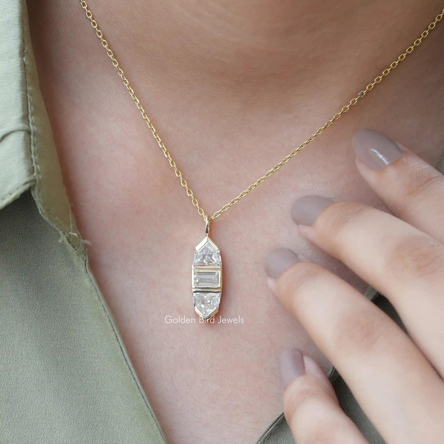 View of baguette and bullet cut moissanite pendant 