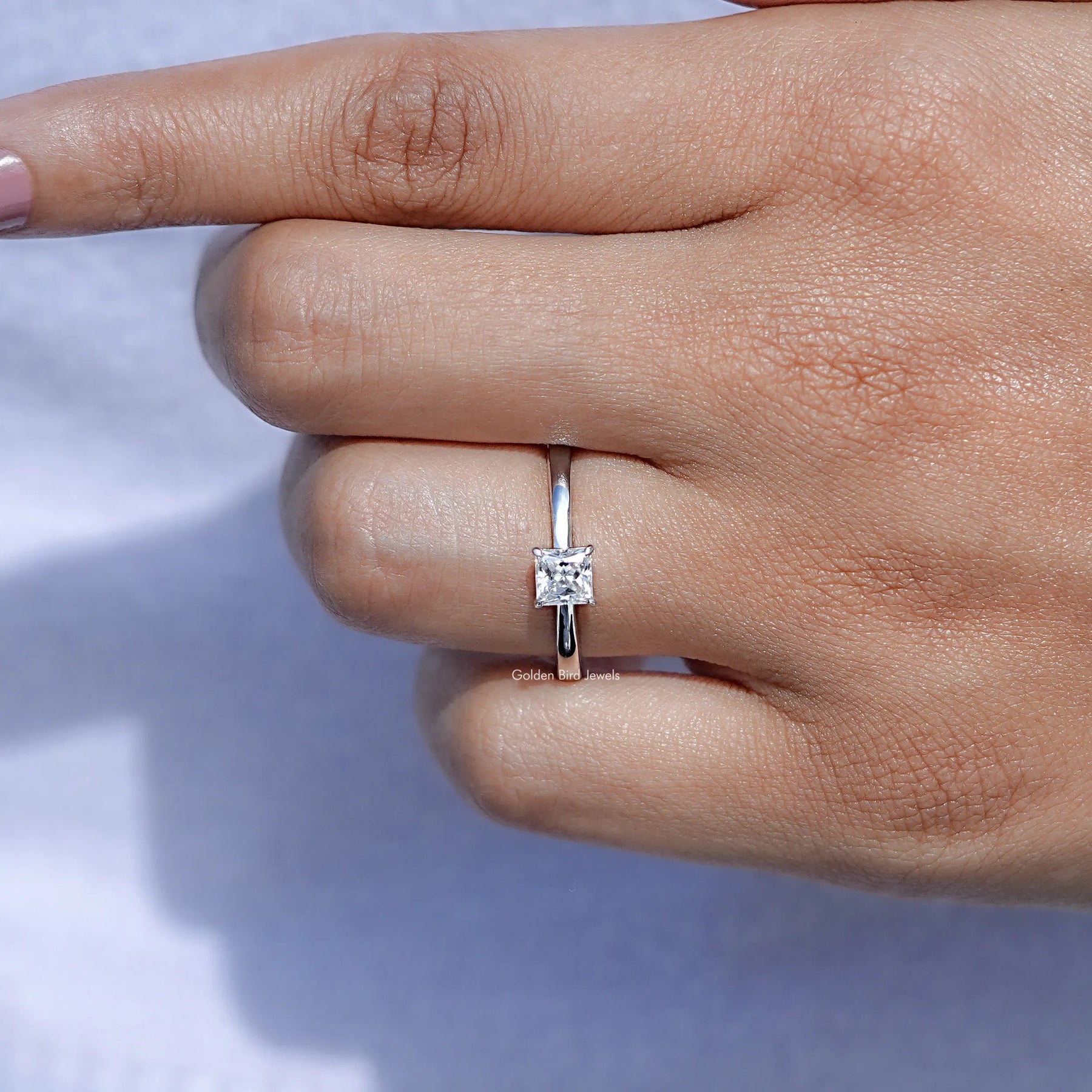 Princess Cut solitaire moissanite ring in white gold 
