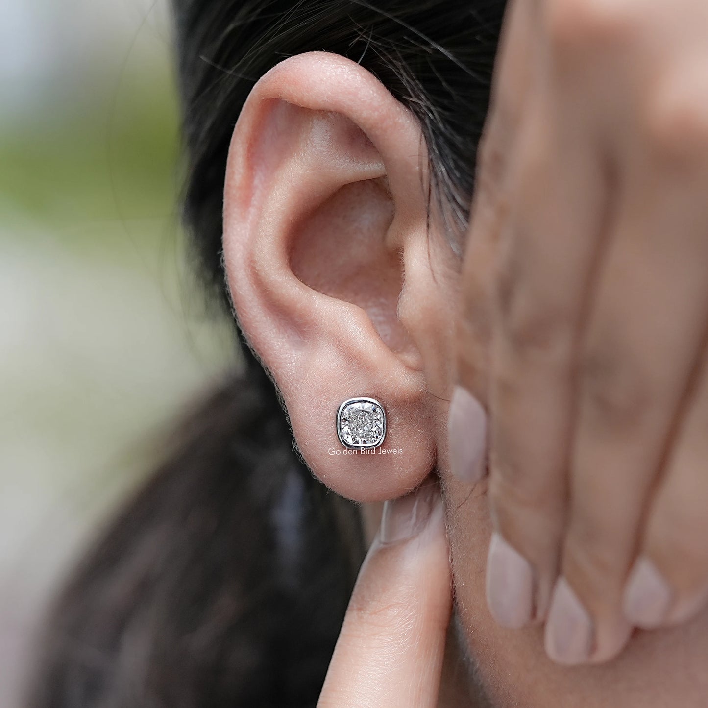 Detailed view of Cushion Cut Lab Diamond Bezel Set Stud Earrings