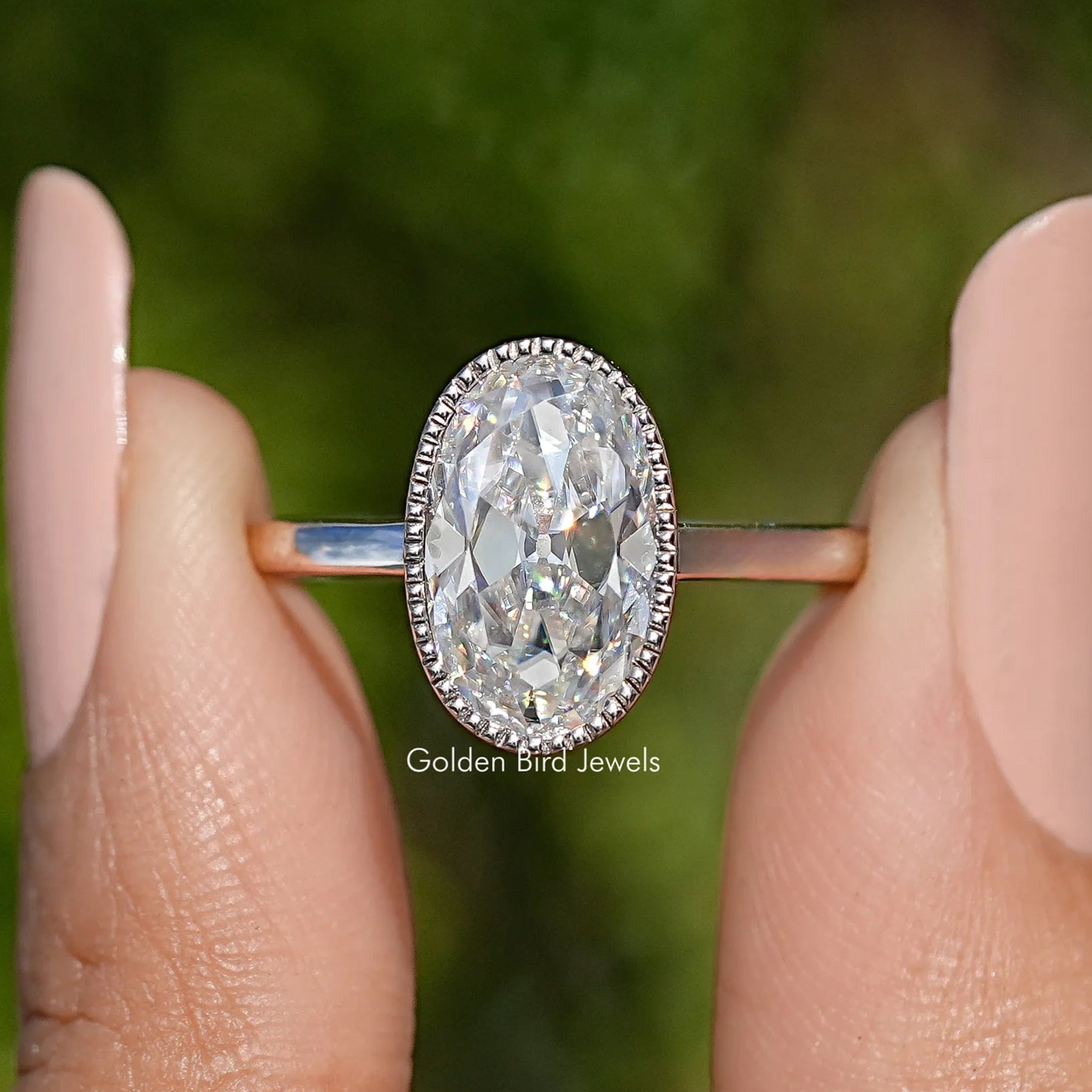 Bezel Set Old Mine Oval Cut Moissanite Ring