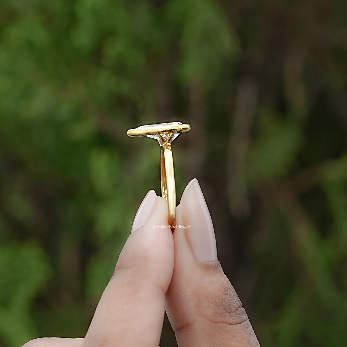 Side View of Bezel Set Pear Cut Diamond Solitaire Ring