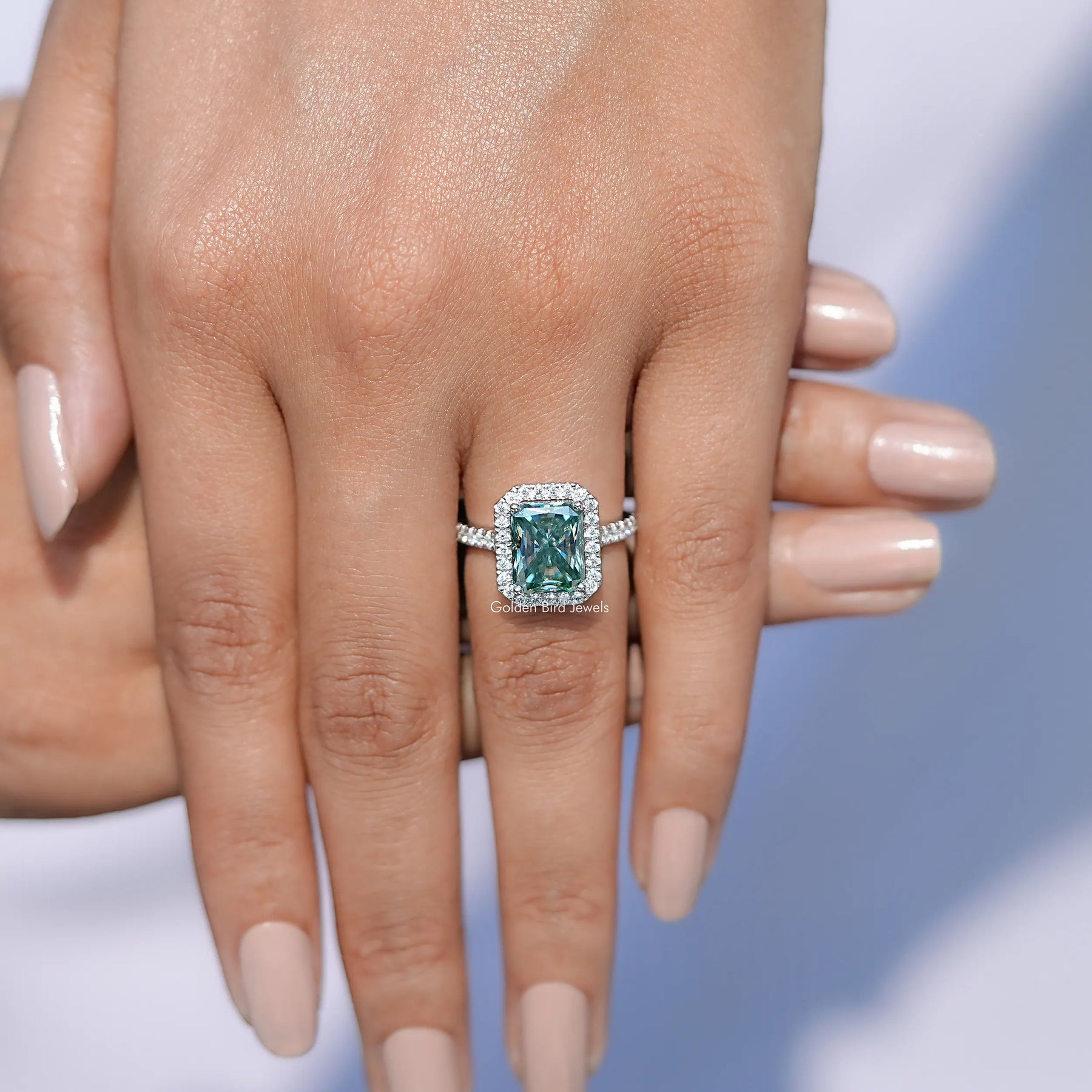 Close view of Blue Green Radiant Cut Moissanite Solitaire Ring