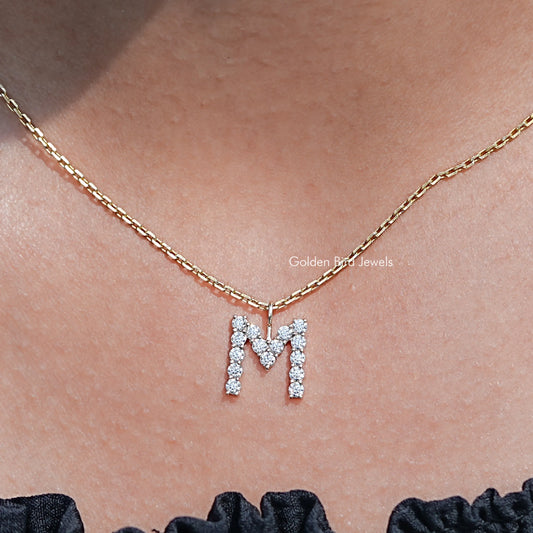 Front view of Colorless Round Moissanite M Letter Pendant