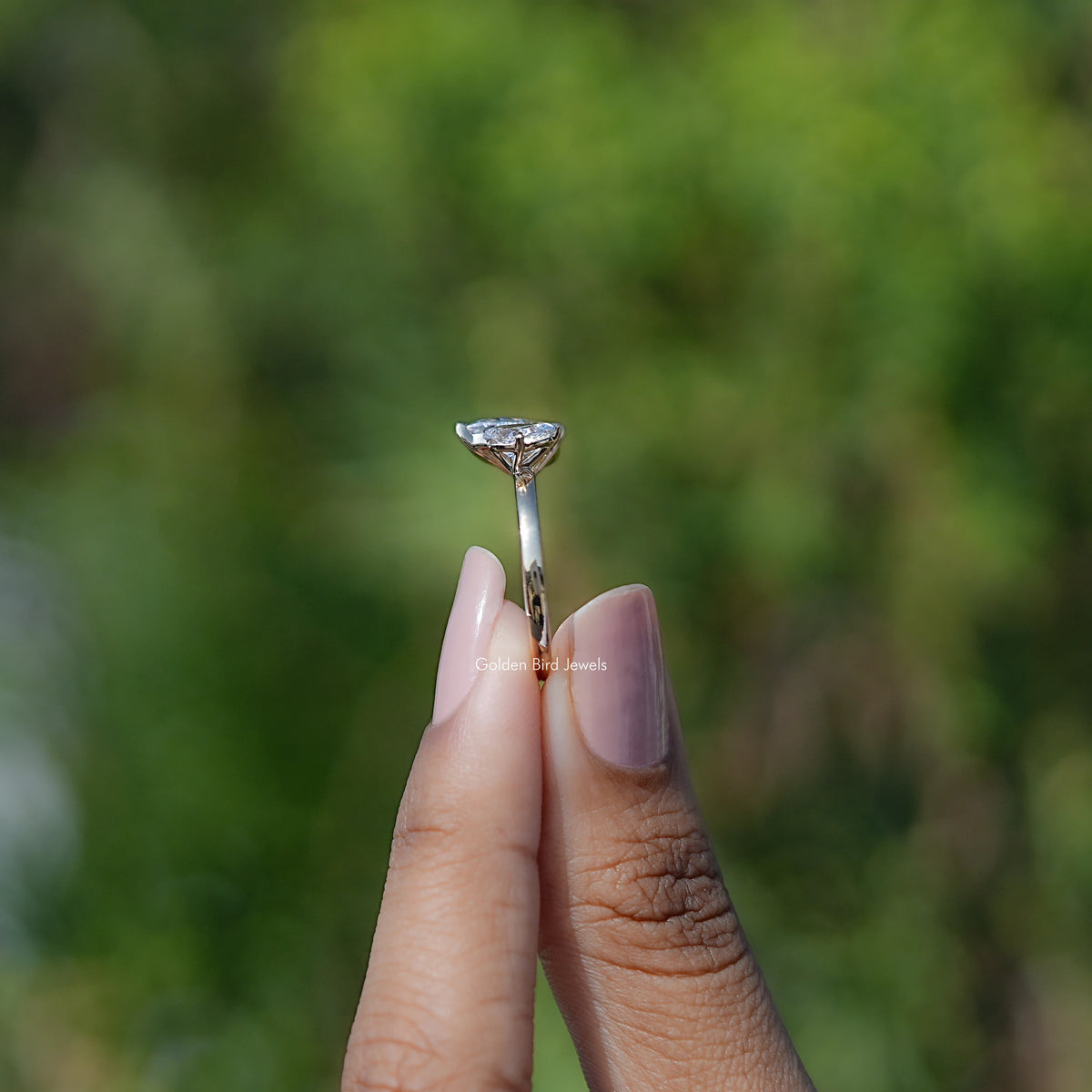 Side View of Pear Shaped Lab Diamond Two Stone Ring
