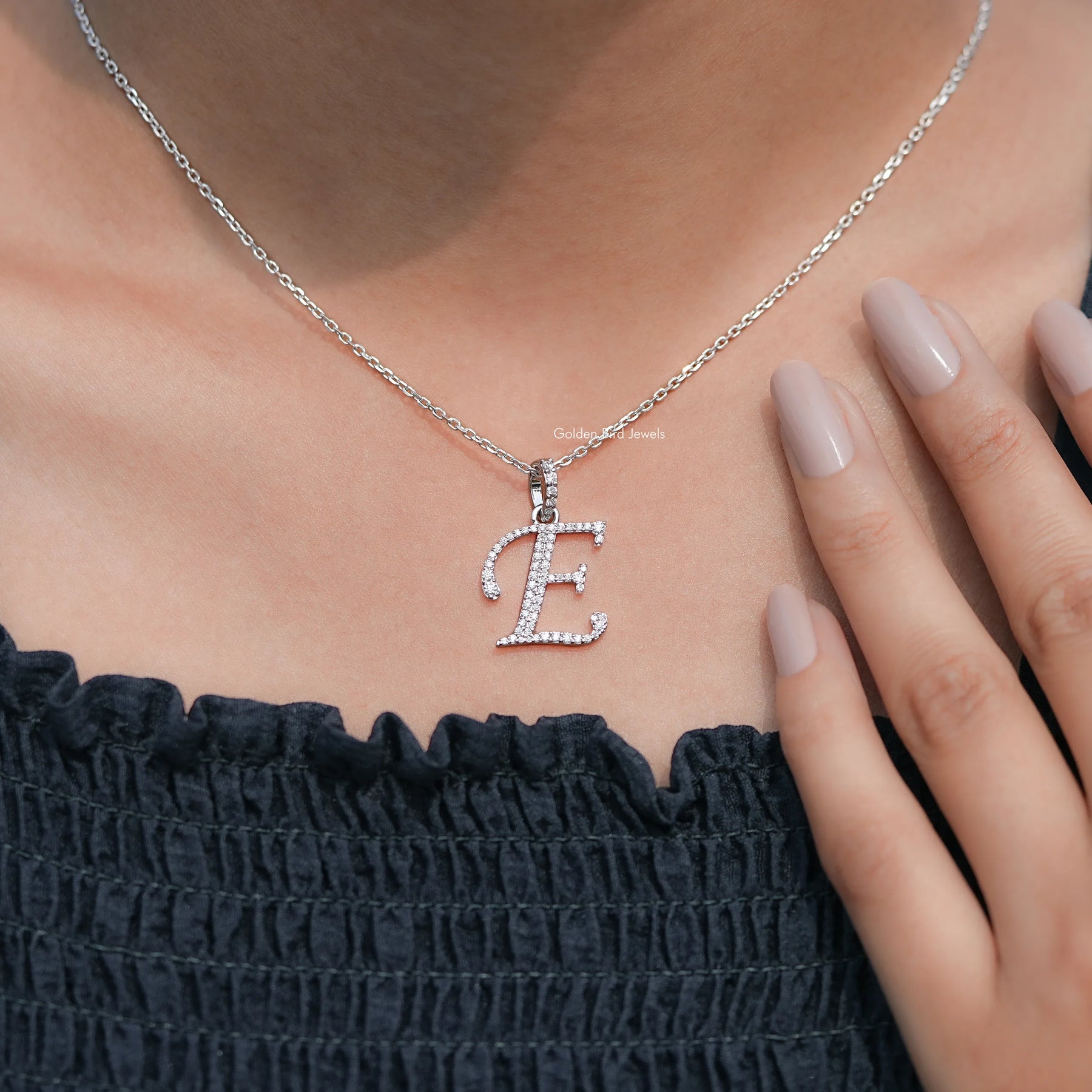 Side View Of E Letter Pendant in unique pattern 