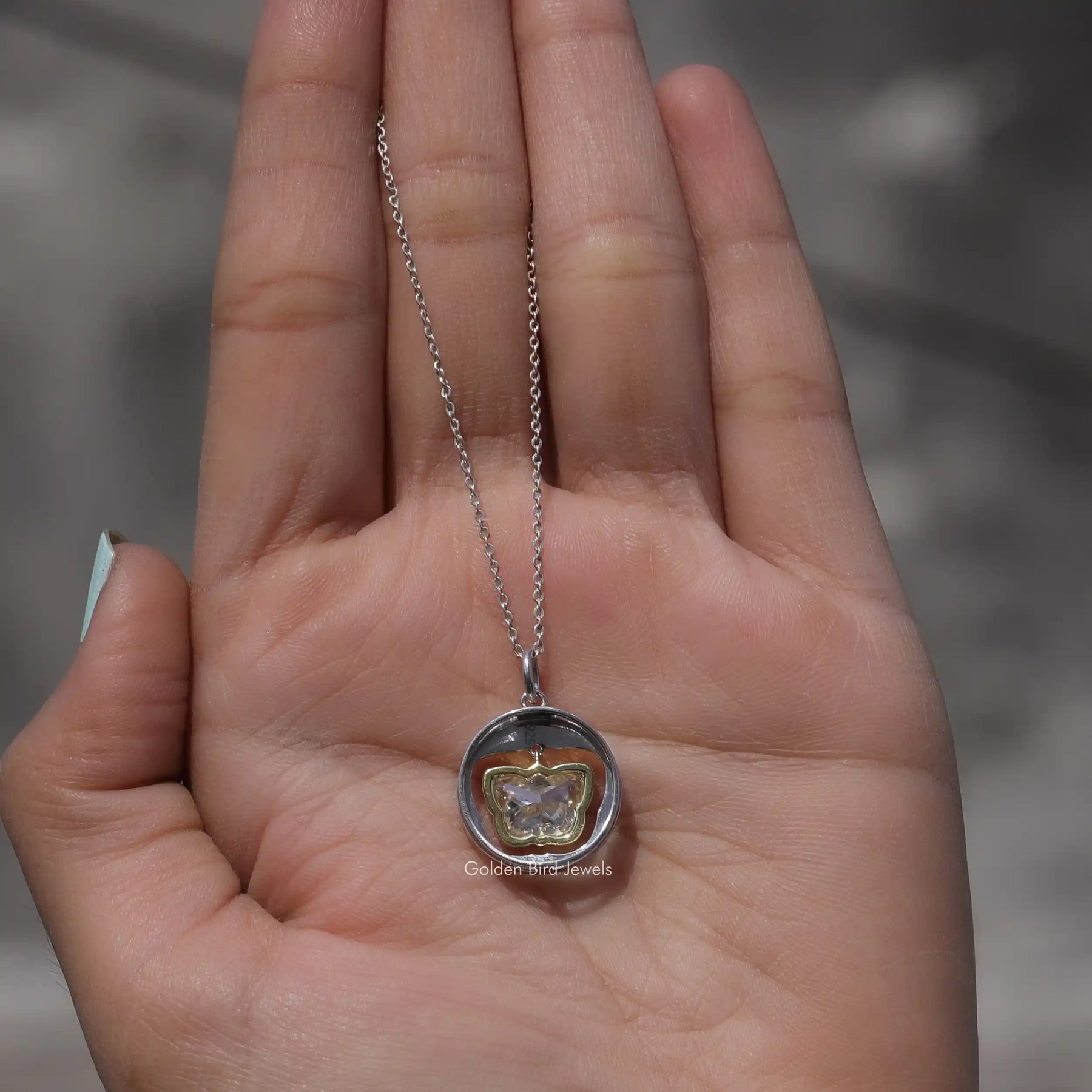 Close view of moissanite chain bracelet in secure setting 