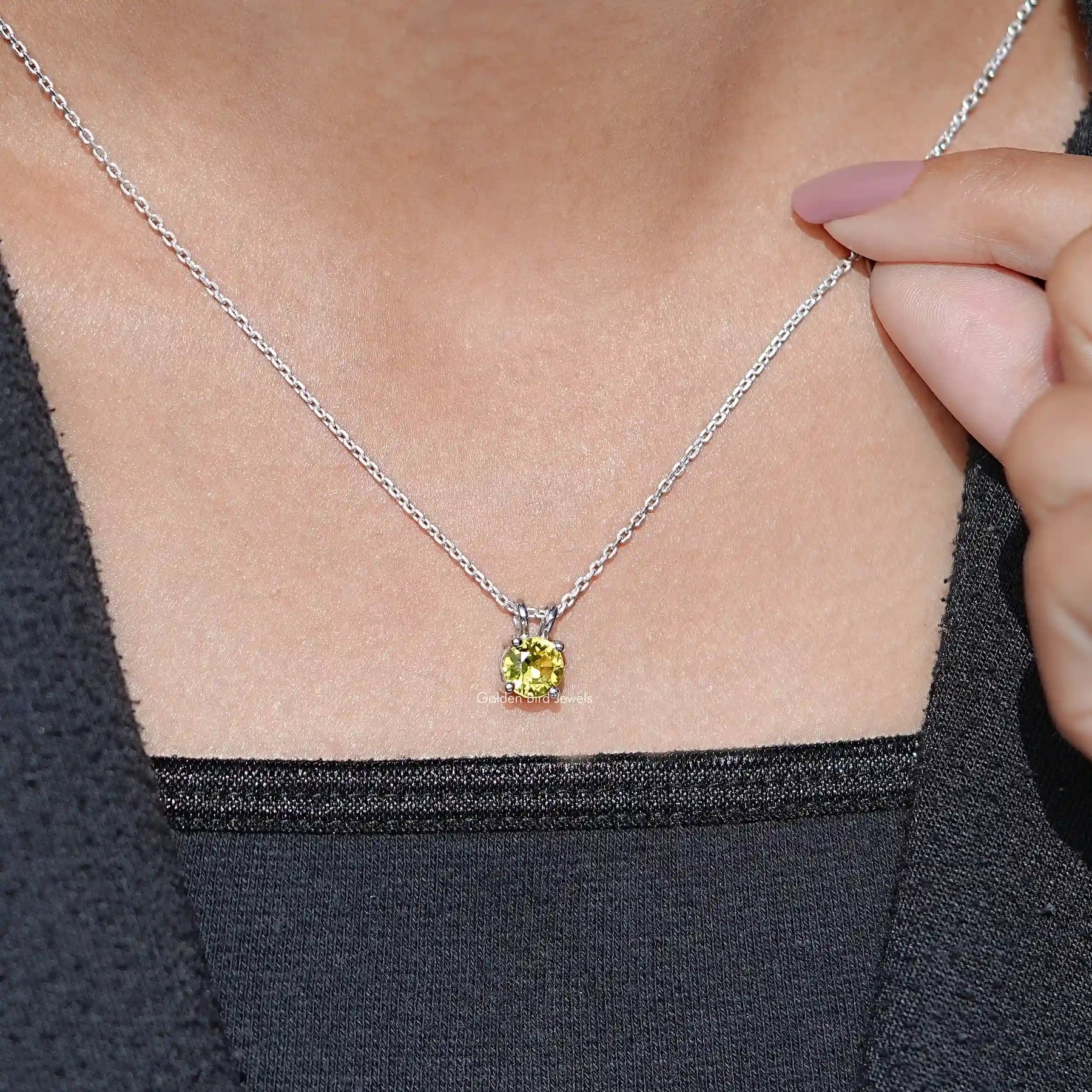 Detailed View Of Necklace With Gemstone Pendant 