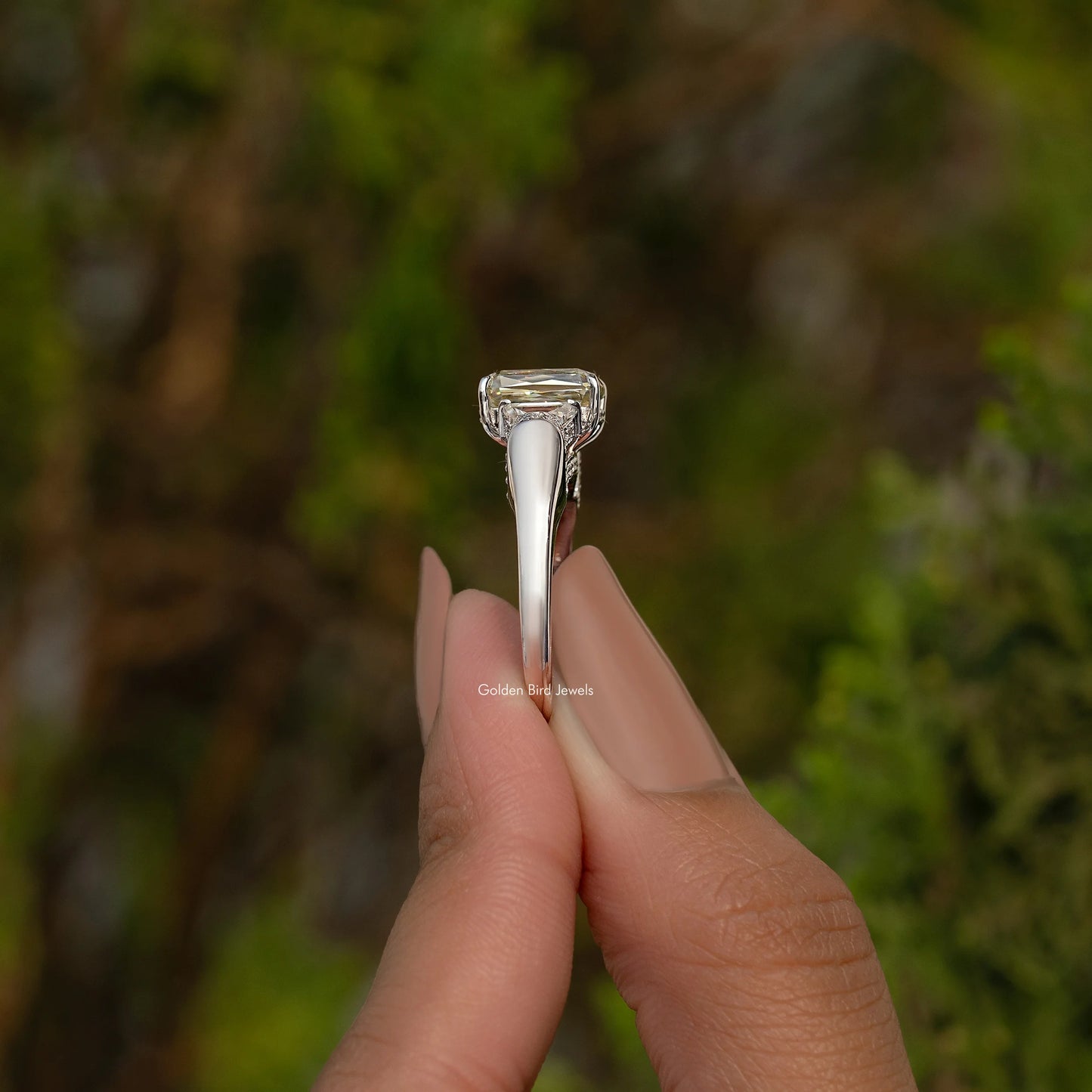 Criss And Trapezoid Cut Three Stone Engagement Ring