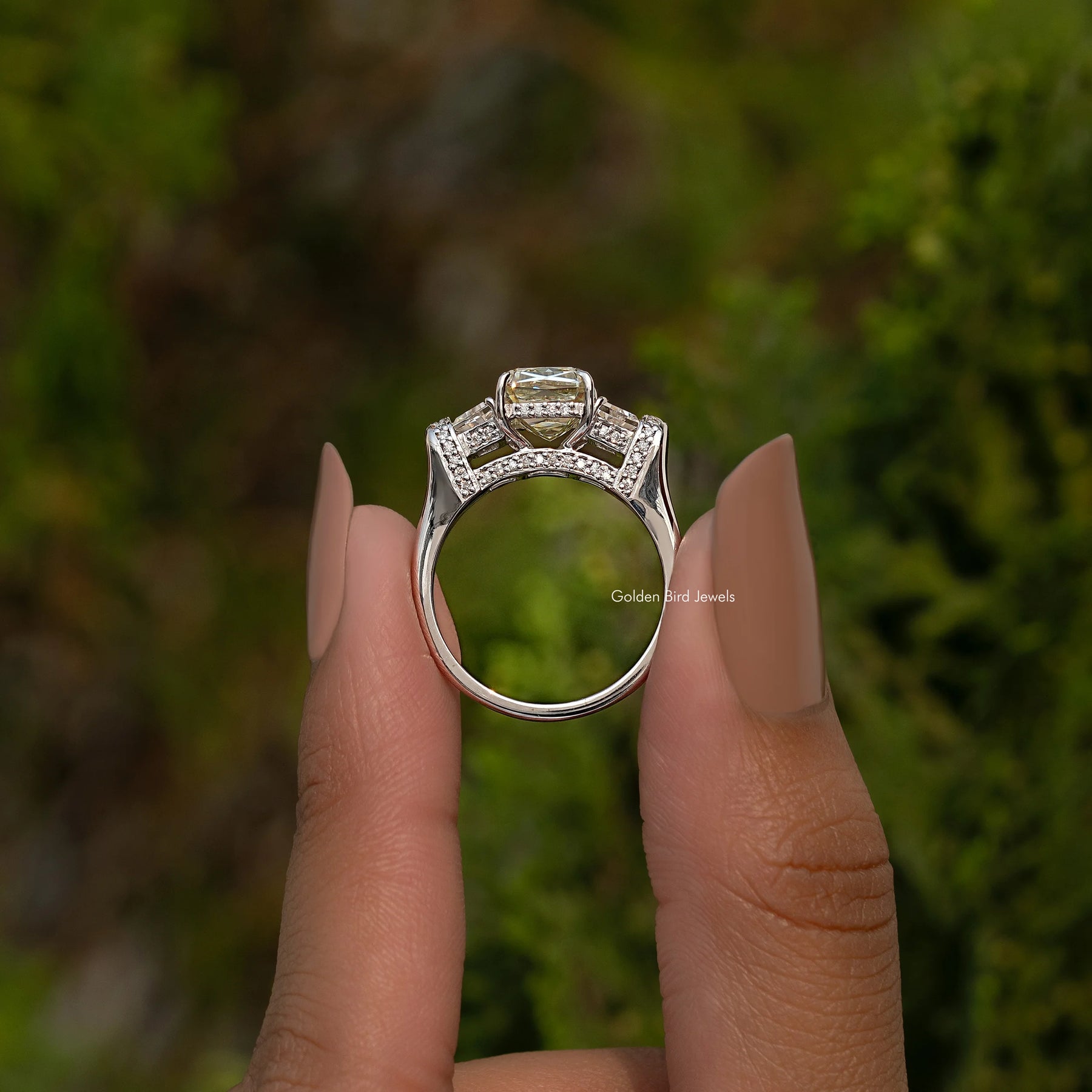 Criss And Trapezoid Cut Three Stone Engagement Ring