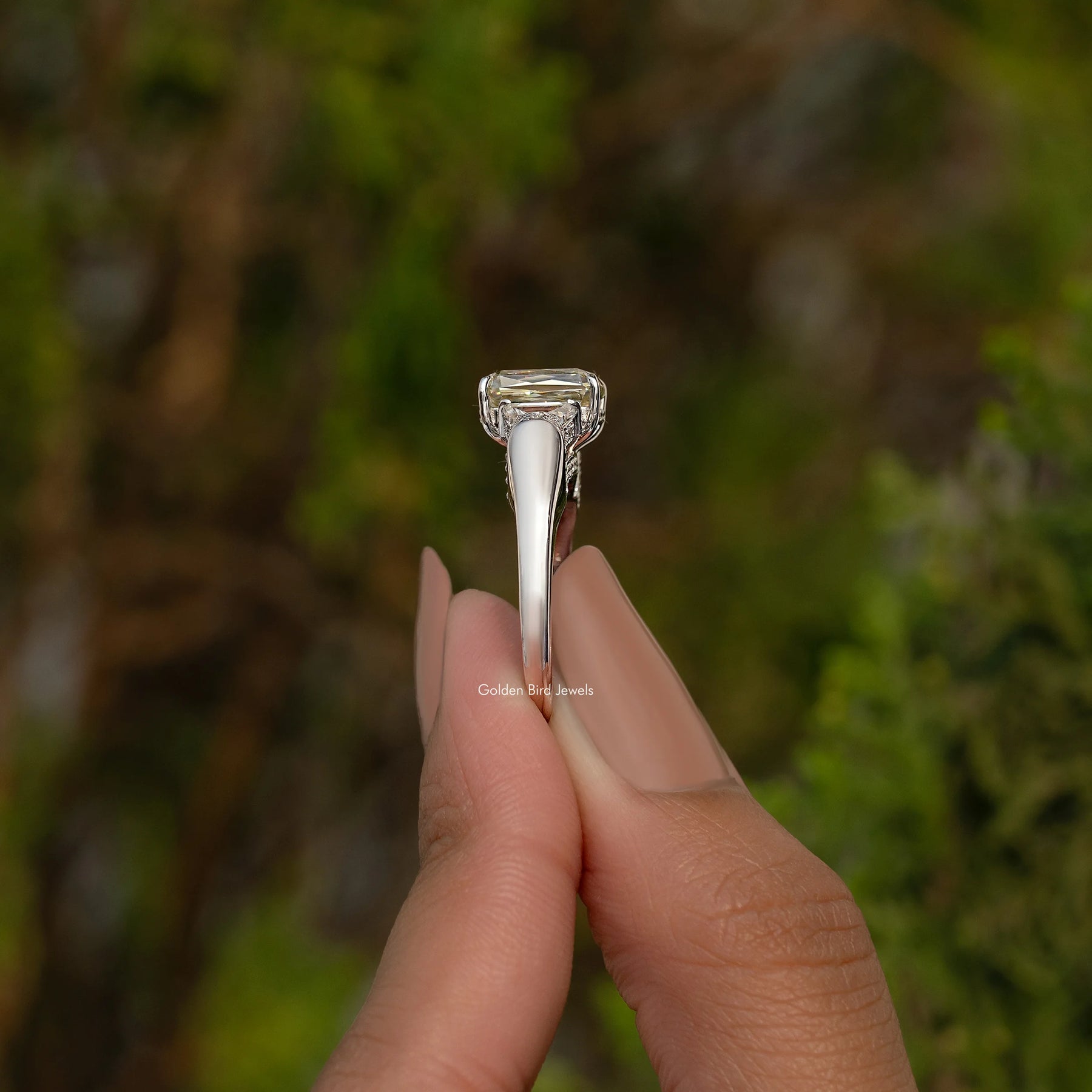 Criss And Trapezoid Cut Three Stone Engagement Ring