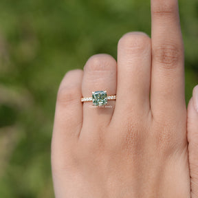 In finger front view of Cushion Cut Moissanite Engagement Ring  