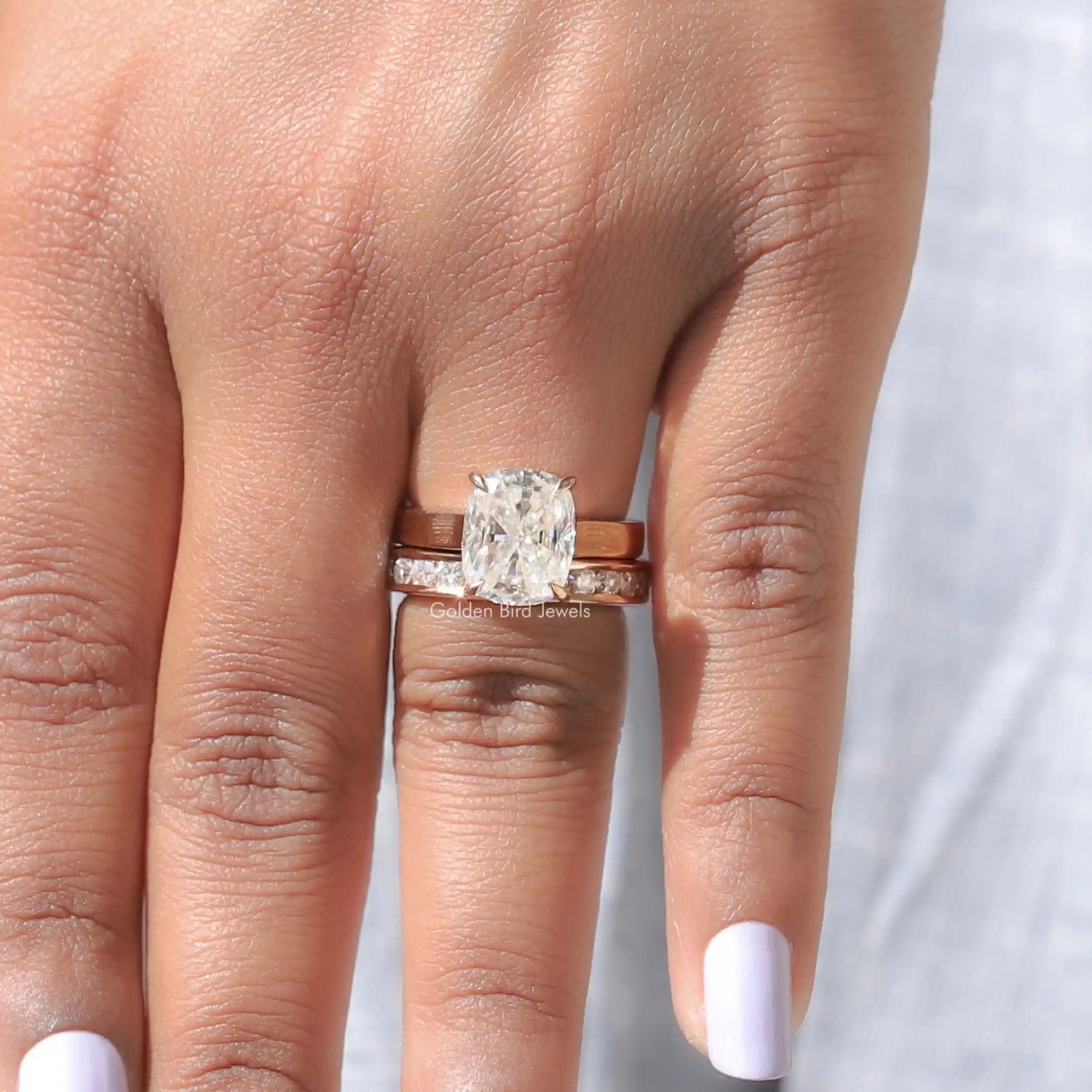 Close-Up View of Moissanite Cushion Cut Bridal Ring Set In Yellow Gold      
