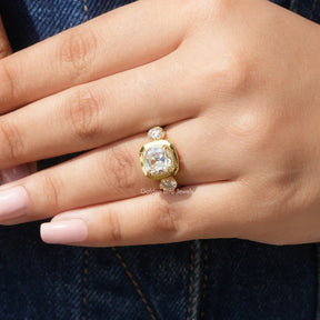 Cushion Cut Moissanite Three Stone Ring In Yellow Gold