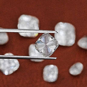 Twijer hold on Lab Grown Cushion Cut Diamond