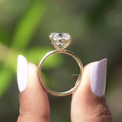 Back View of Cushion Cut Moissanite Ring In two fingers