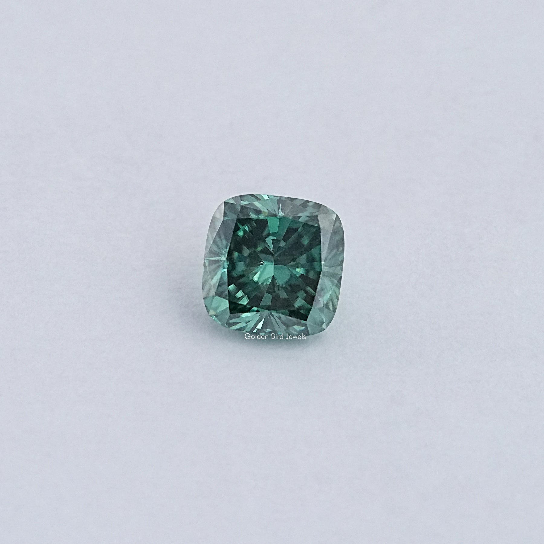 View Of Dark Green Cushion Cut Loose Moissanite 