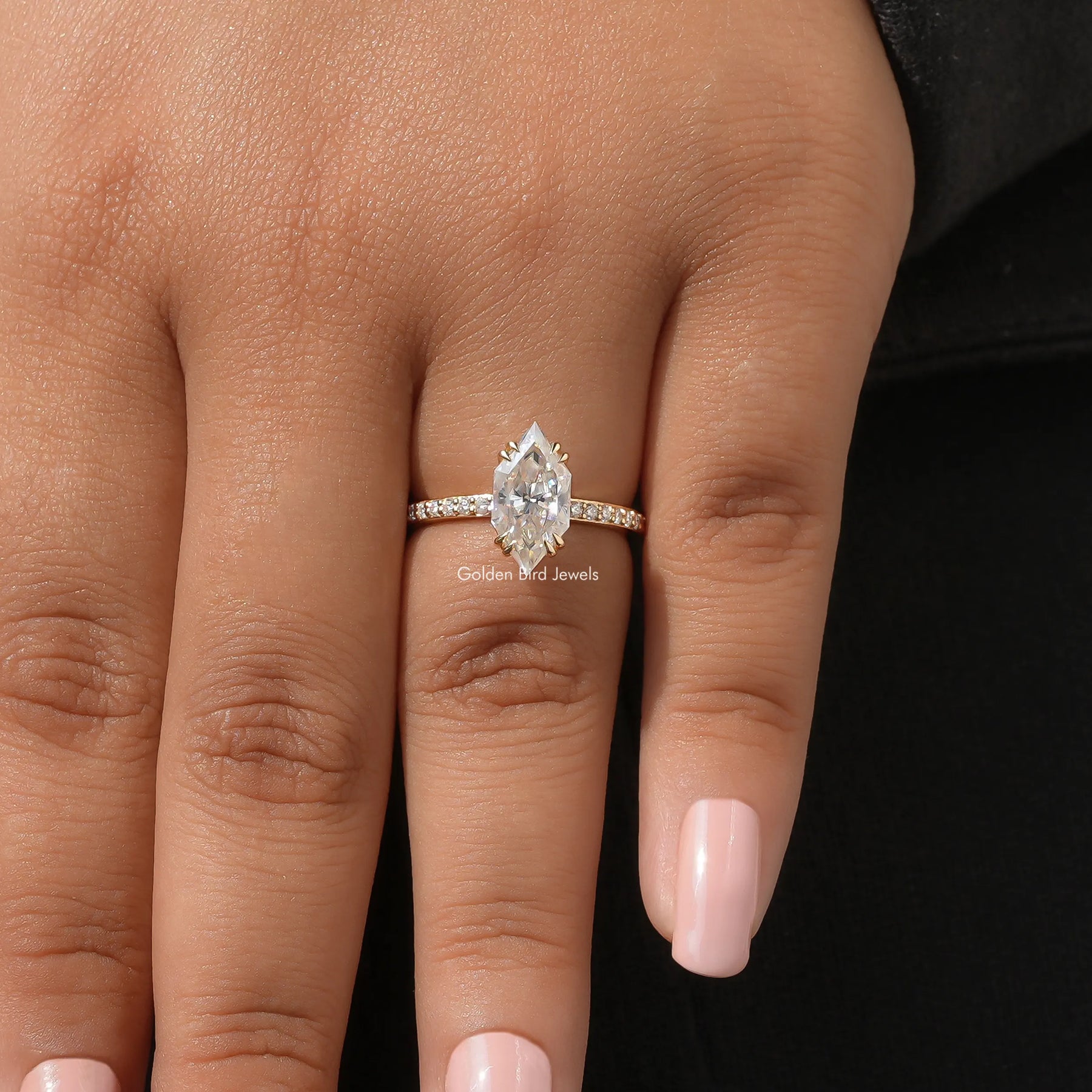 Solitaire marquise engagement ring in prongs setting
