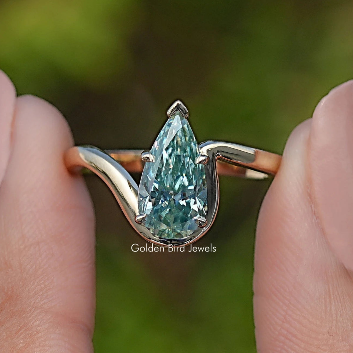 Front View of Elongated Pear Moissanite Solitaire Ring
