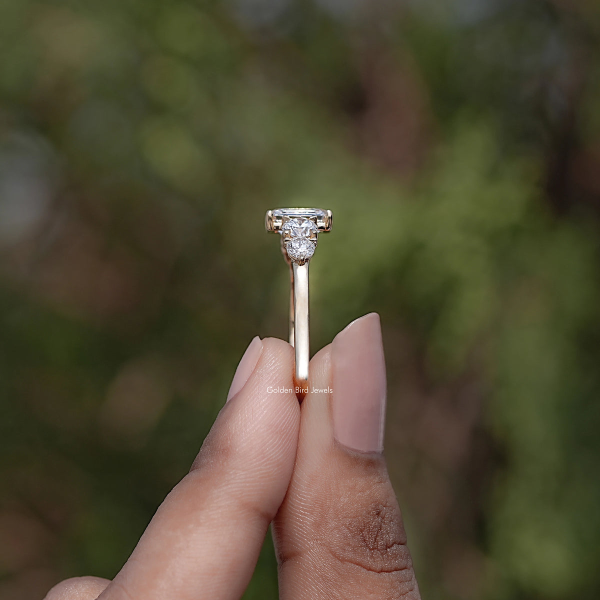 Side View of Emerald Cut Diamond Five Stone Ring