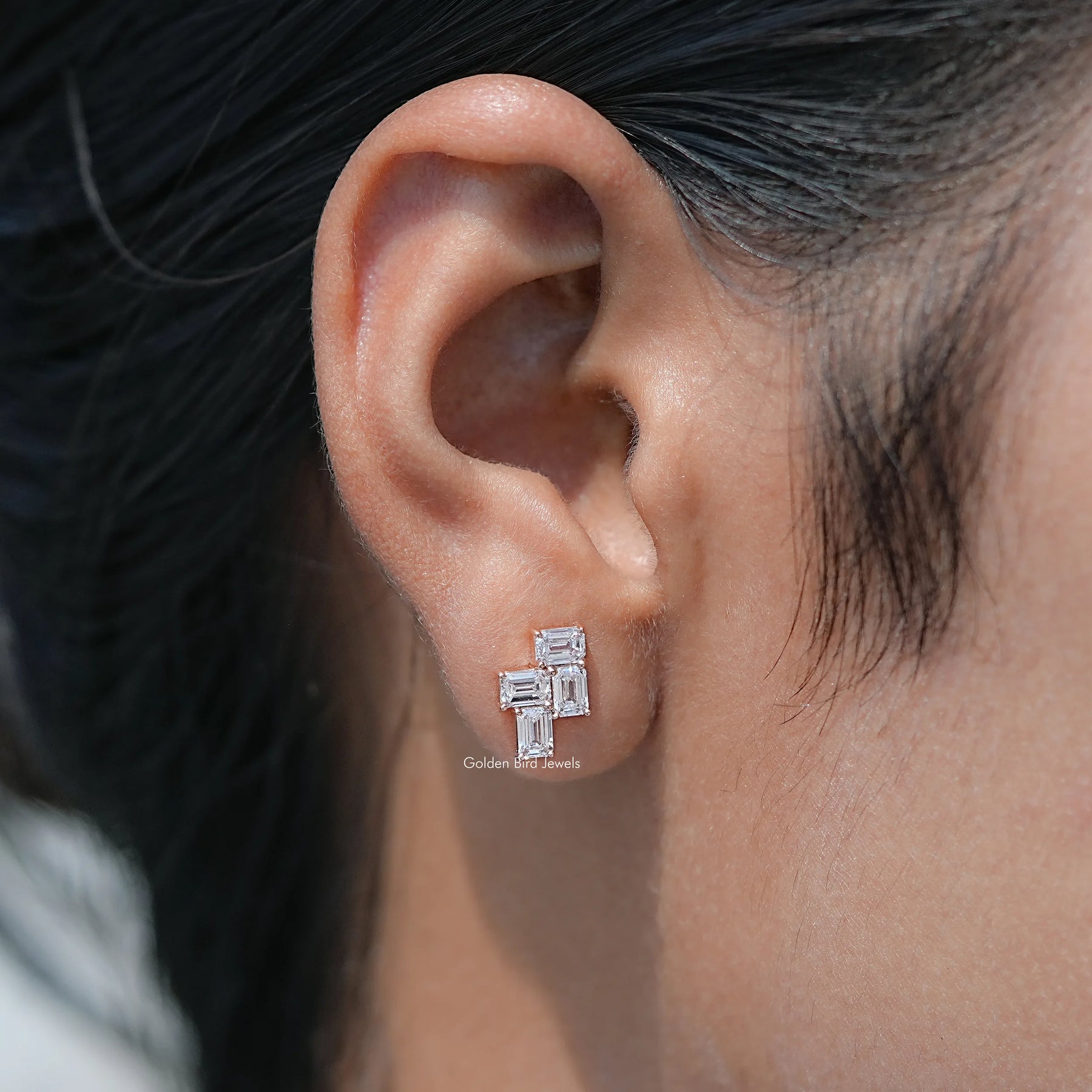 In Ear View Of Round Emerald Cut Lab Grown Diamond Drop Earrings in four prongs setting 