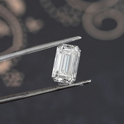 Twijer holding Emerald Cut Lab Grown Loose Diamond