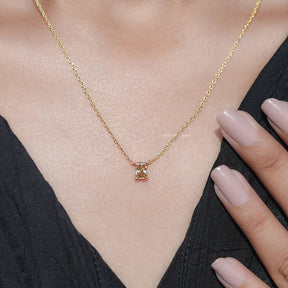 View of Emerald Cut Moissanite Solitaire Ring in prongs setting 