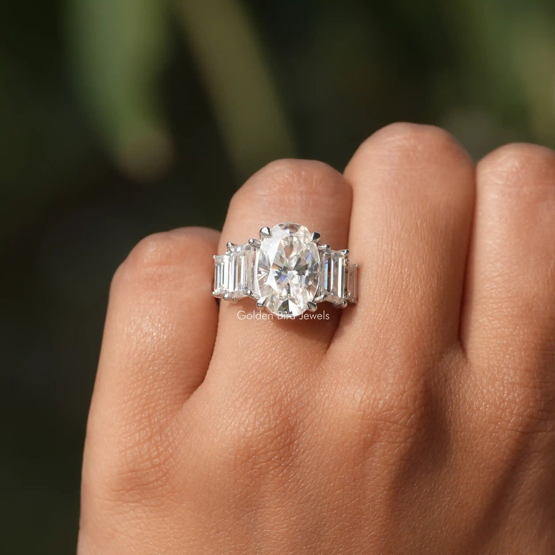 Moissanite Oval And Baguette Cut Engagement Ring In White Gold