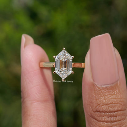 Step Cut Dutch Marquise Lab Diamond Ring held between fingers 