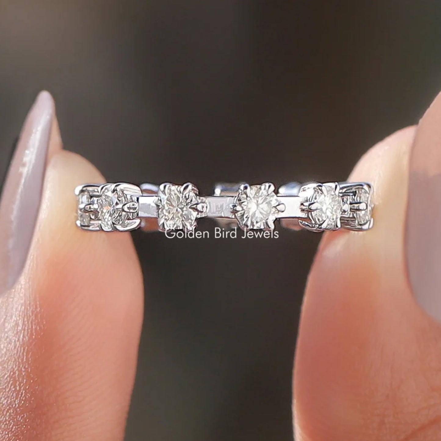 Round Moissanite Distance Eternity Band
