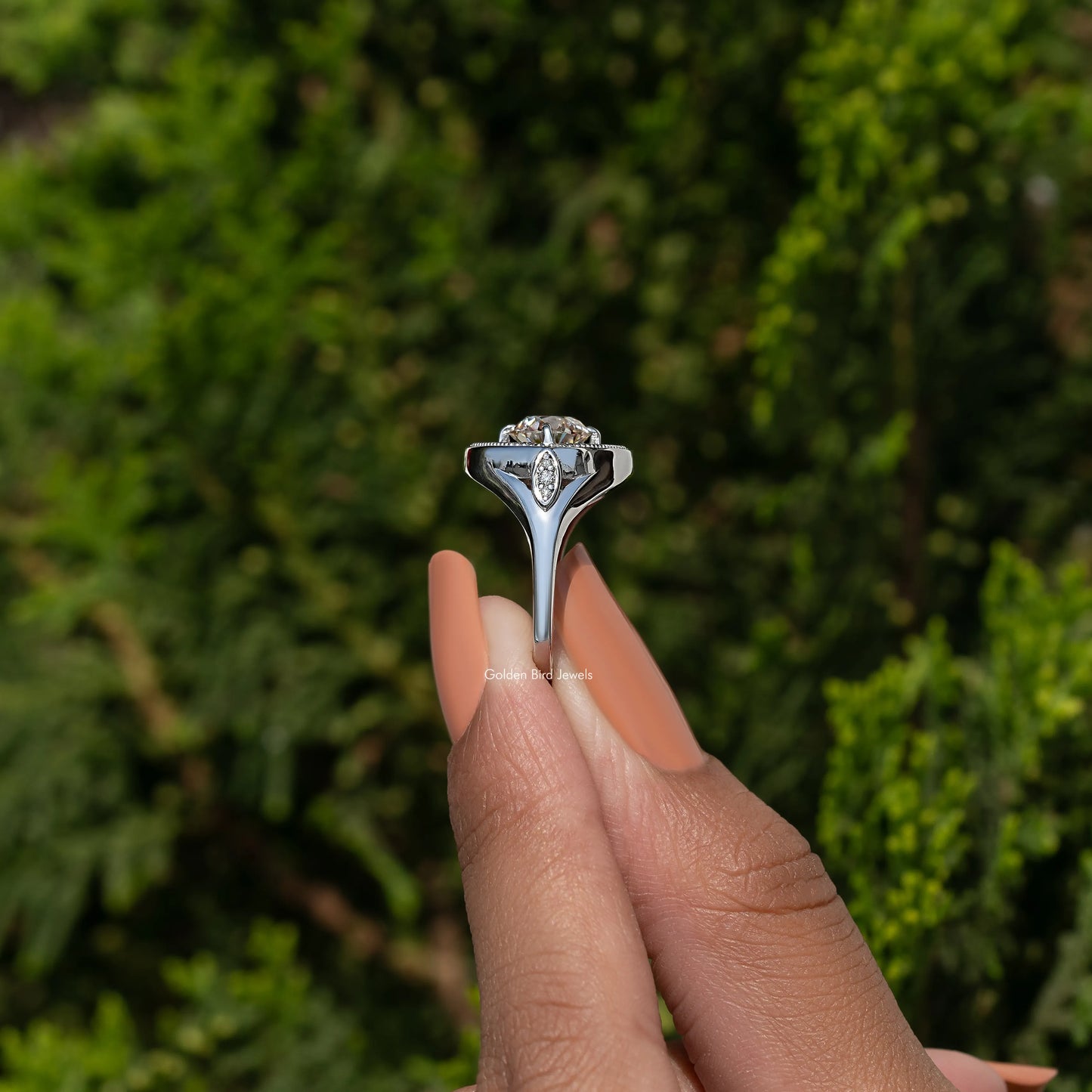 Old European Round And Tapered Baguette Halo Ring