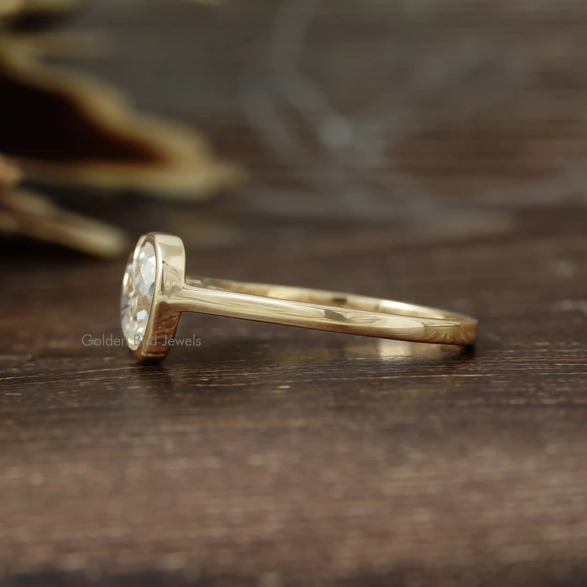 Side View of Heart And Oval Cut Wedding Ring