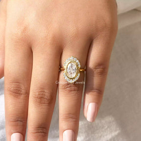 Detailed View Of Crushed Oval Cut Moissanite Engagement Ring  In Yellow Gold