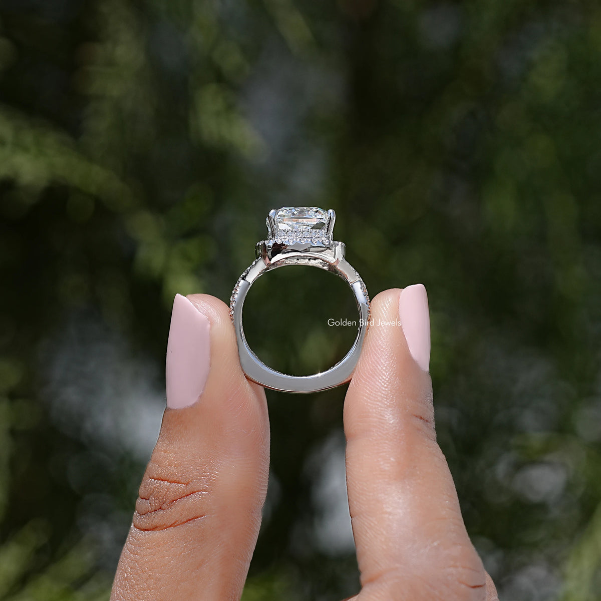 Lab diamond engagement ring with prong-set center stone and detailed twisted band