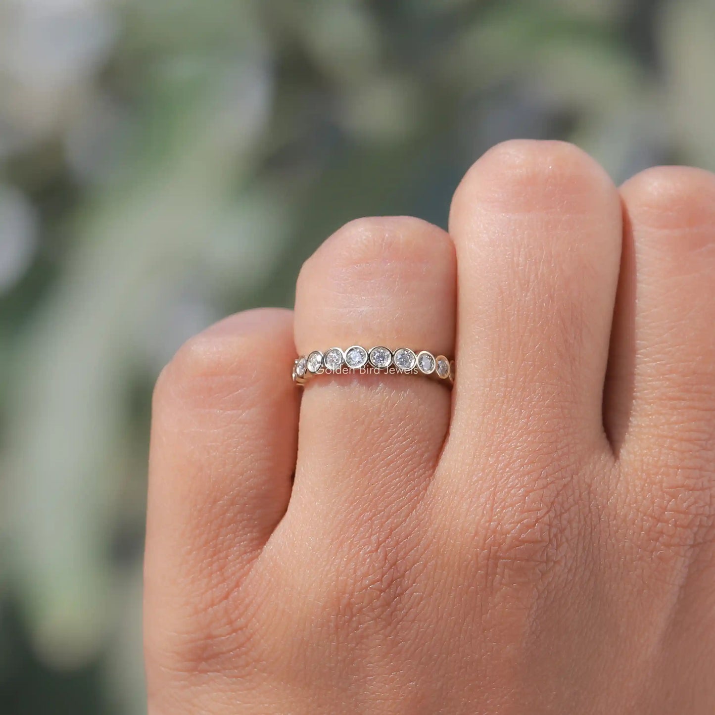 View of Diamond Bezel Set Full Eternity Band In Finger 