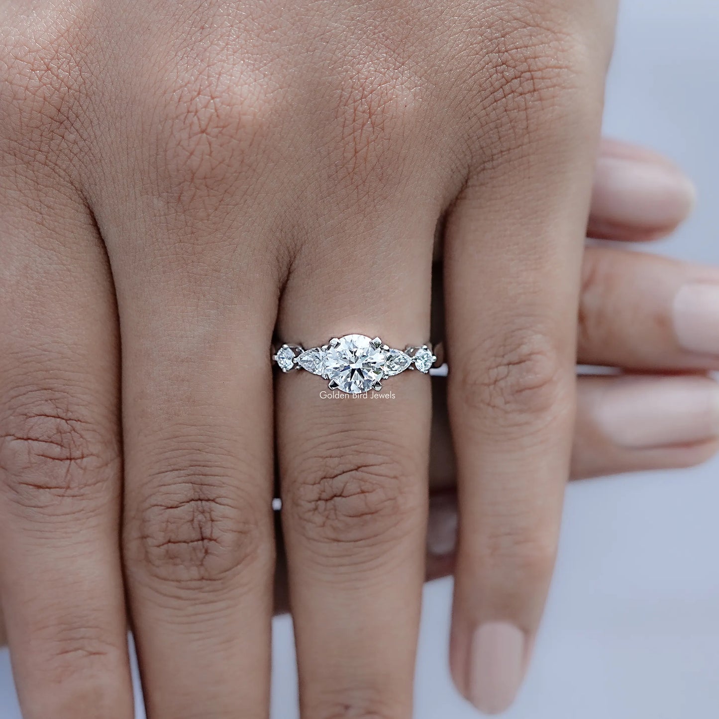 Top view of Round And Pear Cut Lab Diamond Five Stone Ring