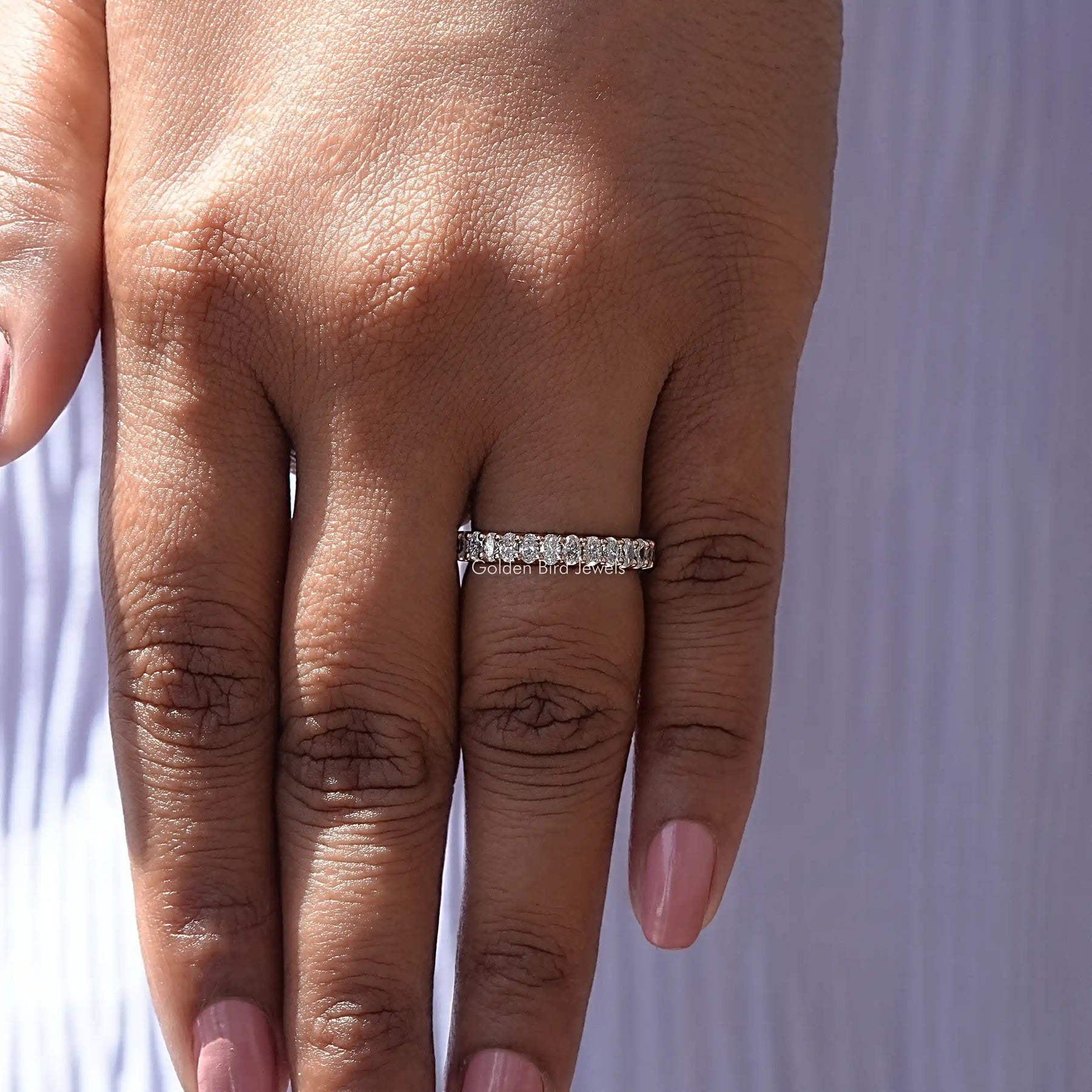 View of Lab Diamond Oval Shaped Half Eternity Band In Yellow Gold