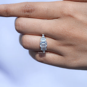 View of Emerald Cut Five Stone Ring In Finger