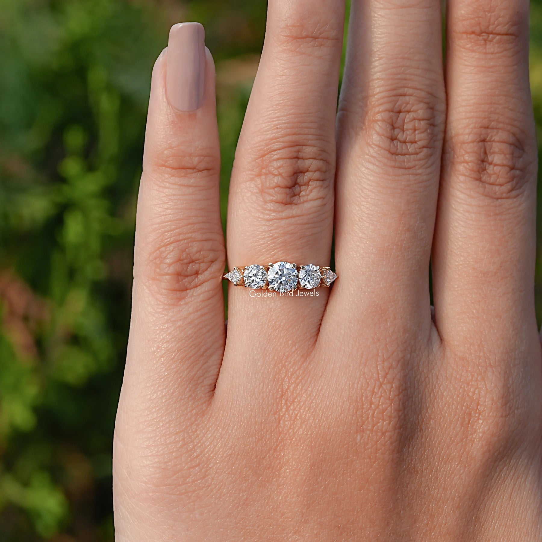 View of Lab Grown Diamond Kite And Round Cut Ring In Yellow Gold