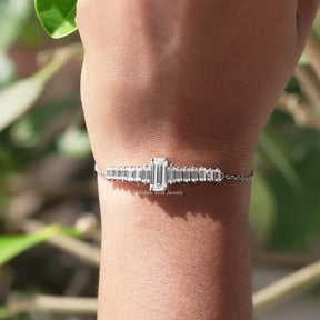 In hand showing view of moissanite bracelet