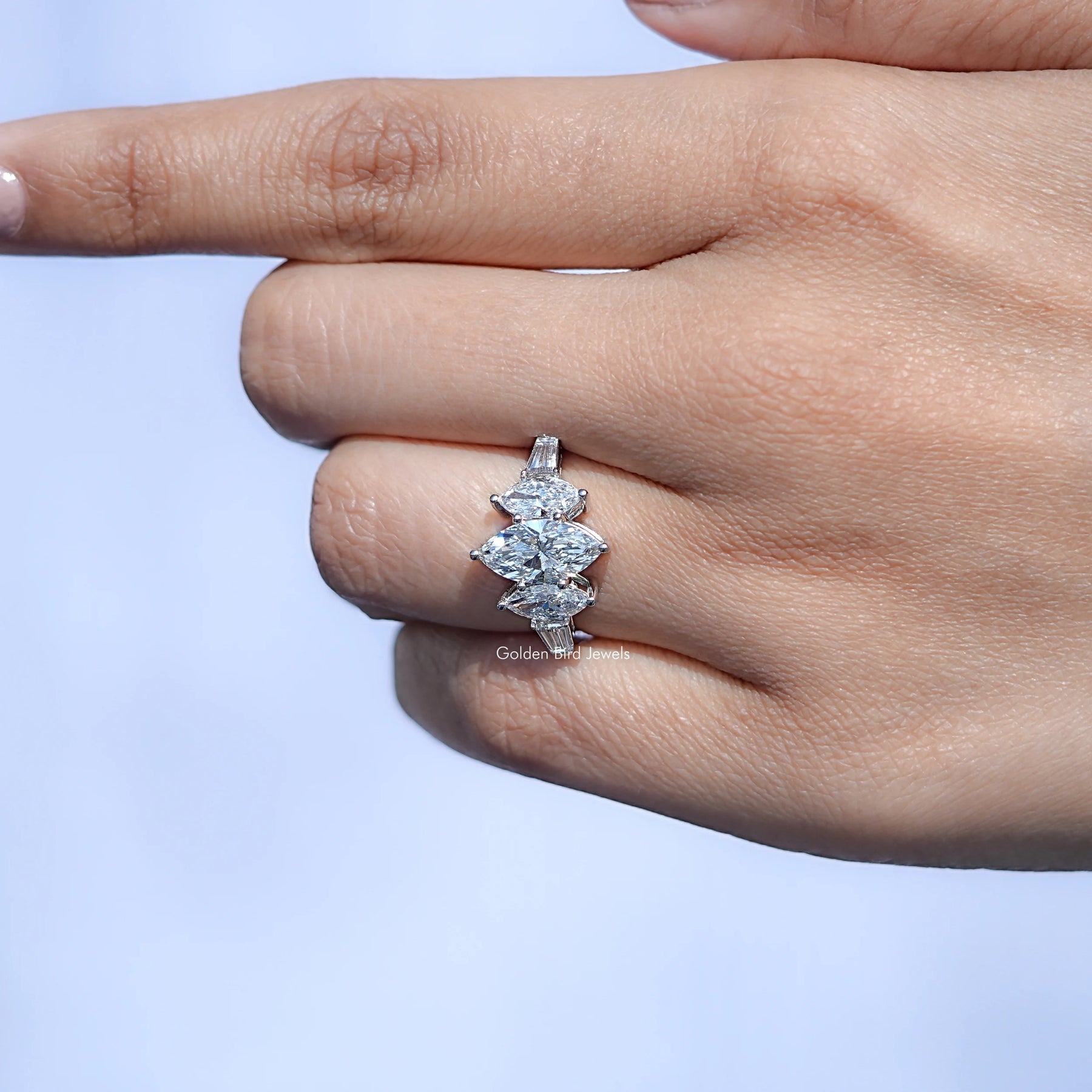 View of Marquise Cut Lab Diamond Five Stone Ring In Finger 