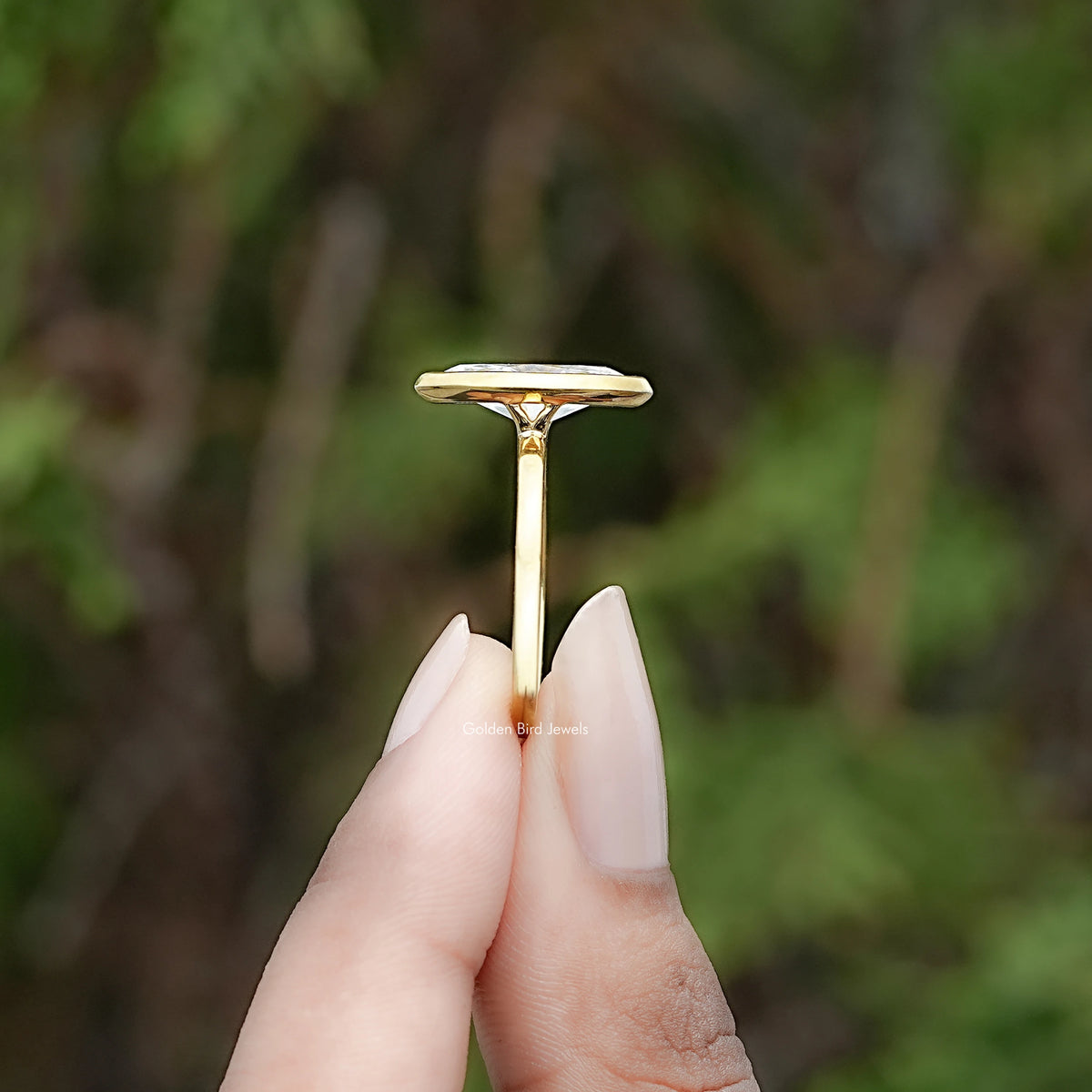 Side View of Marquise Cut Diamond Bezel Set Ring
