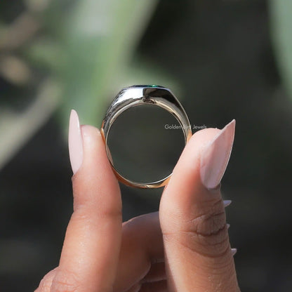 Back View of Moissanite Marquise Bezel Set Ring In two fingers