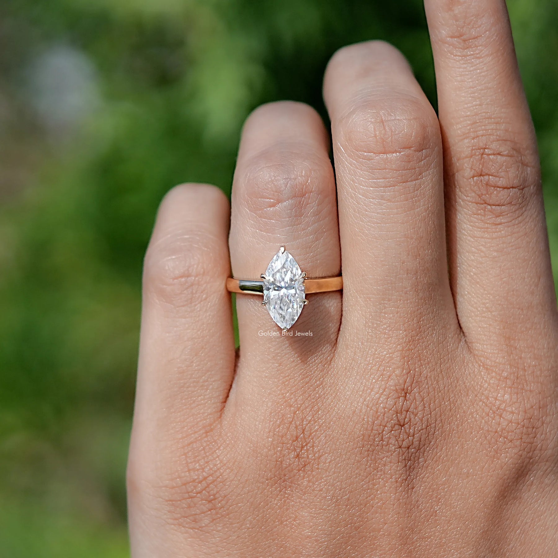 In finger front view of Dutch Marquise Cut Moissanite engagement ring 