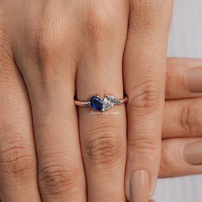 Sterling silver toi et moi ring with pear-cut blue and pear-cut white stones