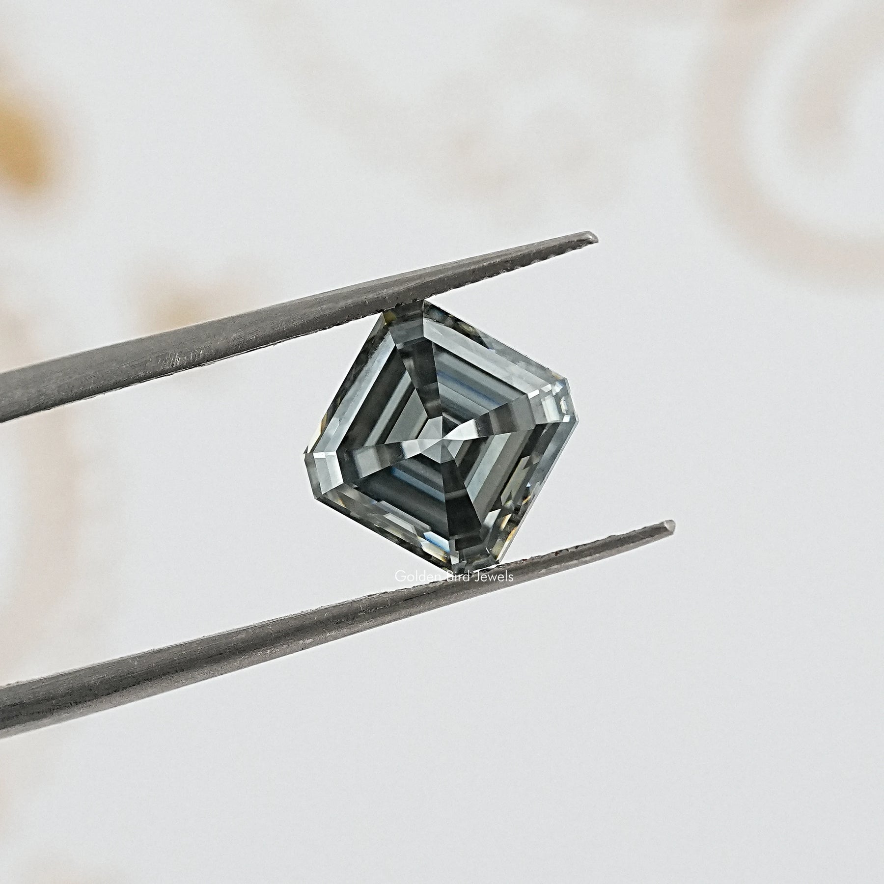 tweezers  View of Gray Asscher Cut Moissanite Gem