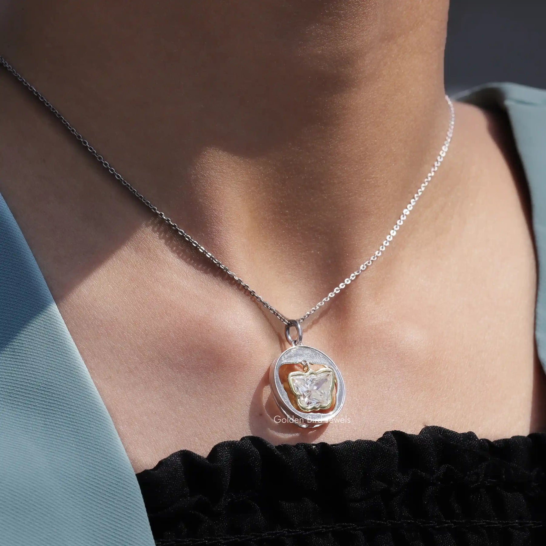 Full view of moissanite pendant in unique shape 